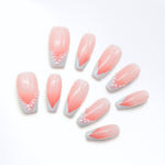 False nails press on nails acrylic nails pink nude V-shape balletcore French tip nails with pearls